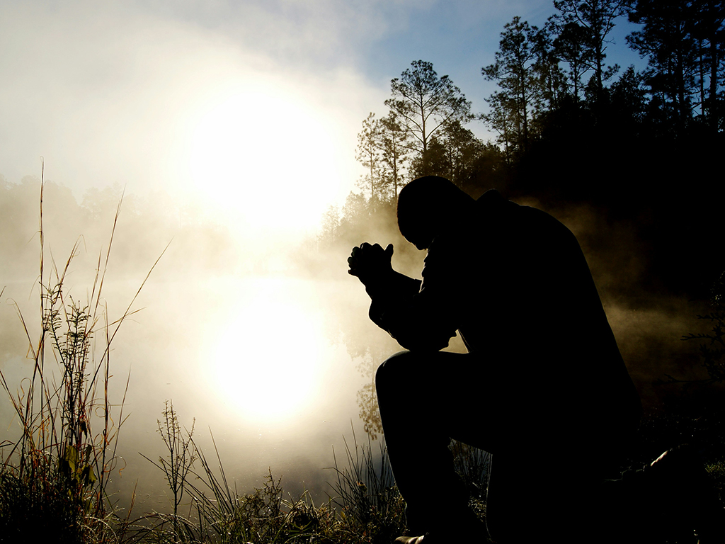 Devout Devotion: Man Engaged in Prayer and Fasting